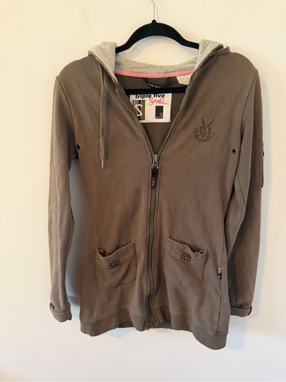 Triple Five Soul brown zip-up hoodie with gray and pink accents